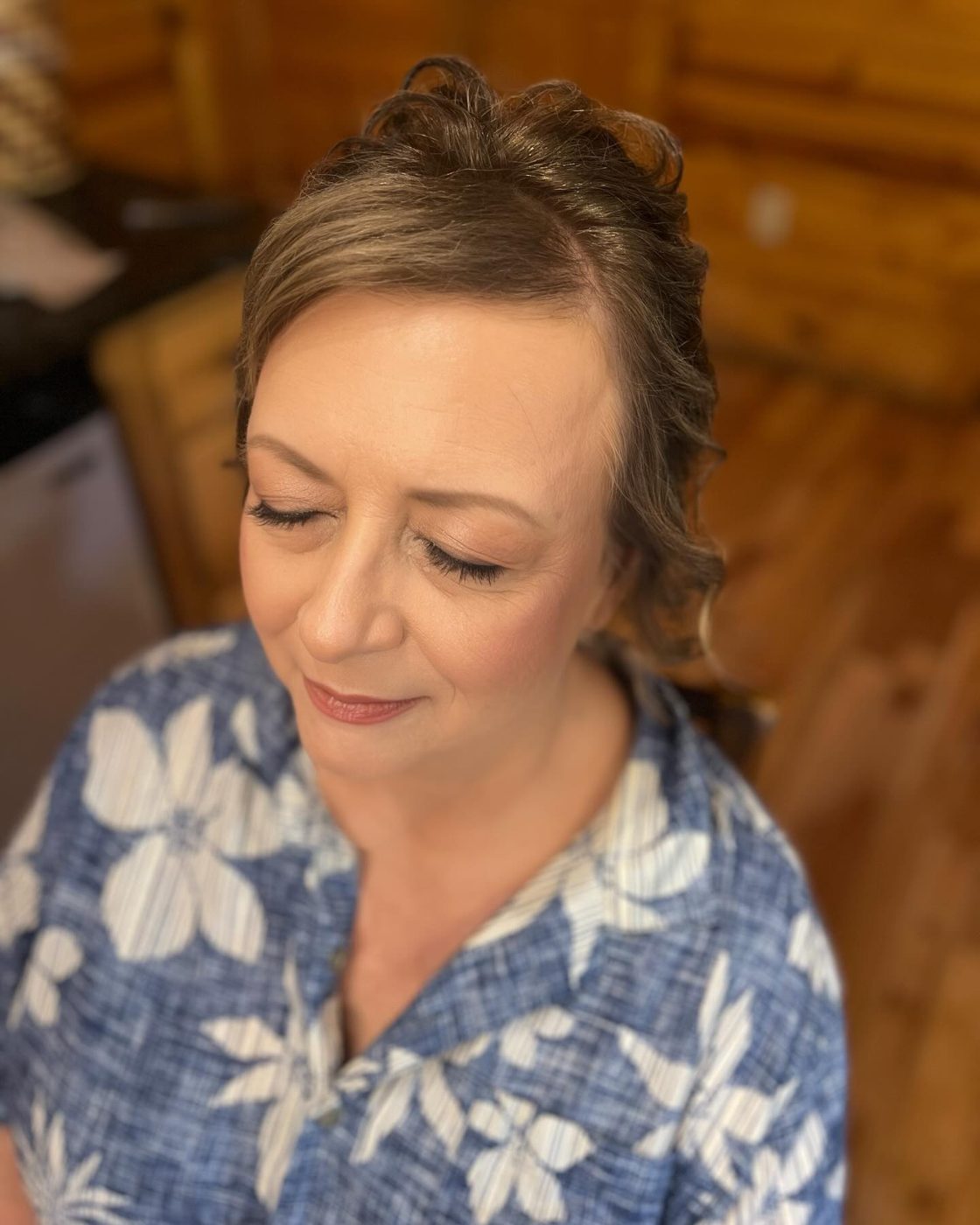 A soft, textured updo with natural makeup